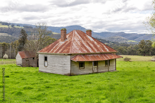 View of an old abandoned farm house photo