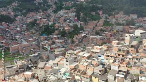Drone capture the aerial shot of the densely crammed residence of Favela a slum or shantytown located in Brazil