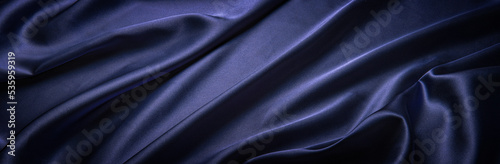 青いサテンの布の背景テクスチャー