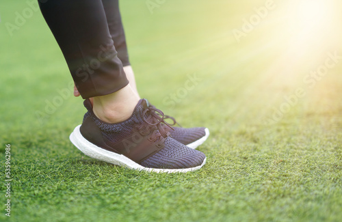woman prepare run shoes before jogging