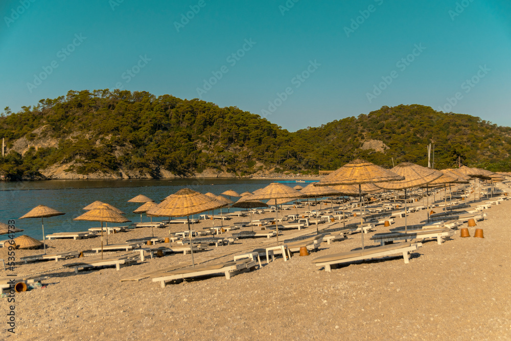 Beautiful landscape with beach and sea. The concept of a summer holiday. Beautiful landscape with beach and sea. The concept of a summer holiday.