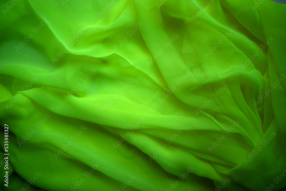 Photo of the texture of green fabric. Salad-colored textiles. Transparent green tulle. Photo of the texture of green fabric. Salad-colored textiles. Transparent green tulle.