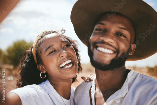 Couple, selfie and happy black people together in nature with a smile outdoor. Portrait of a girlfriend and boyfriend with happiness and relationship love gratitude smiling on a summer day walking