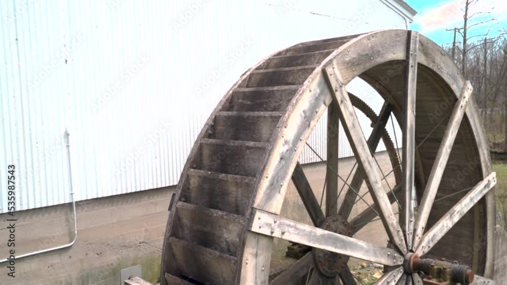 waterwheel from old grist mill at Wolcott Mill Metropark in Michigan. Slow motion pan waterwheel from old grist mill at Wolcott Mill Metropark in Michigan. Slow motion pan