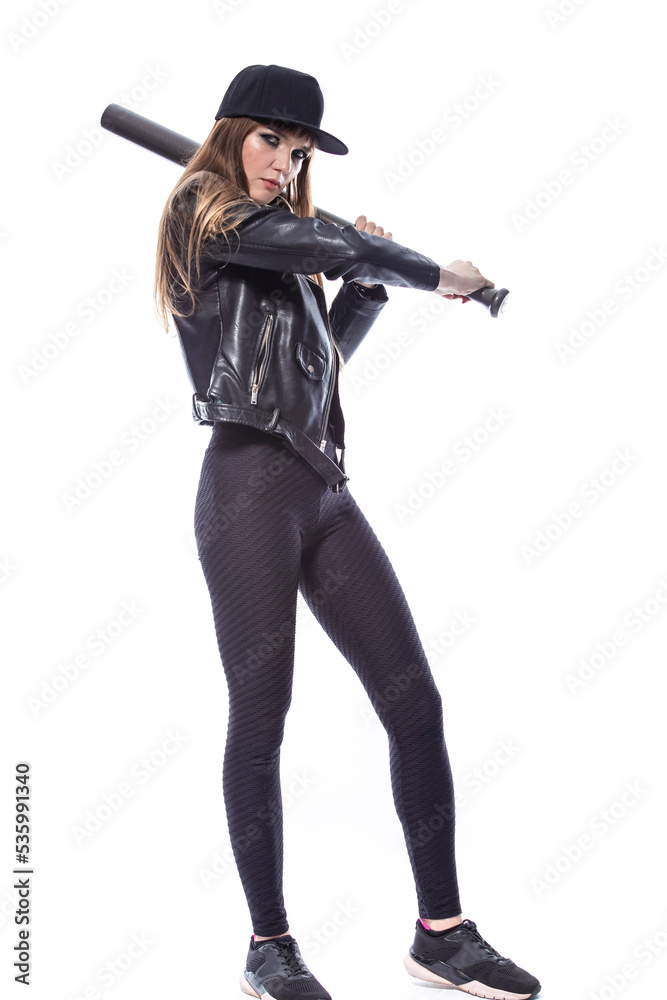 Full Length Portrait of Winsome Expressive Caucasian Female Baseball Player Athlete Posing with Bat While Wearing Cap and Sport Outfit Against Pure White. Full Length Portrait of Winsome Expressive Caucasian Female Baseball Player Athlete Posing with Bat While Wearing Cap and Sport Outfit Against Pure White.
