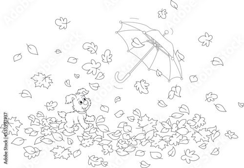 Merry little puppy playing and chasing a toy umbrella flying and swirling in the wind among falling leaves in an autumn park, black and white outline vector cartoon illustration for a coloring book
