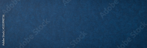 マーブル調の質感のある紺色の紙の背景テクスチャー
