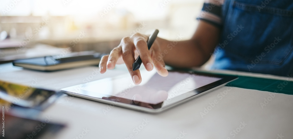 Hand, tablet and design with a woman small business owner working on the internet in her creative startup. Tech, zoom and online with a female designer or entrepreneur at work in her studio closeup Hand, tablet and design with a woman small business owner working on the internet in her creative startup. Tech, zoom and online with a female designer or entrepreneur at work in her studio closeup