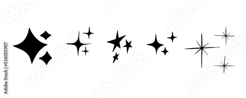 Sparkles stars doodle symbols. Set of hand drawn vector sparkle icon. Bright firework  shiny flash  decoration twinkle. Glowing light effect. Stock vector illustration.