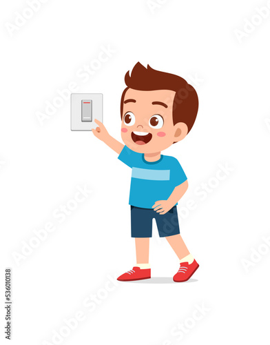 little kid press electric power switch on the wall