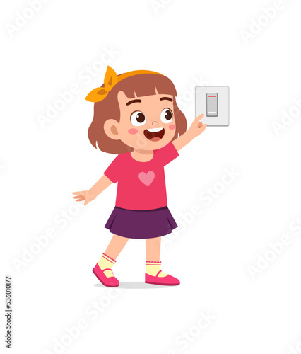 little kid press electric power switch on the wall