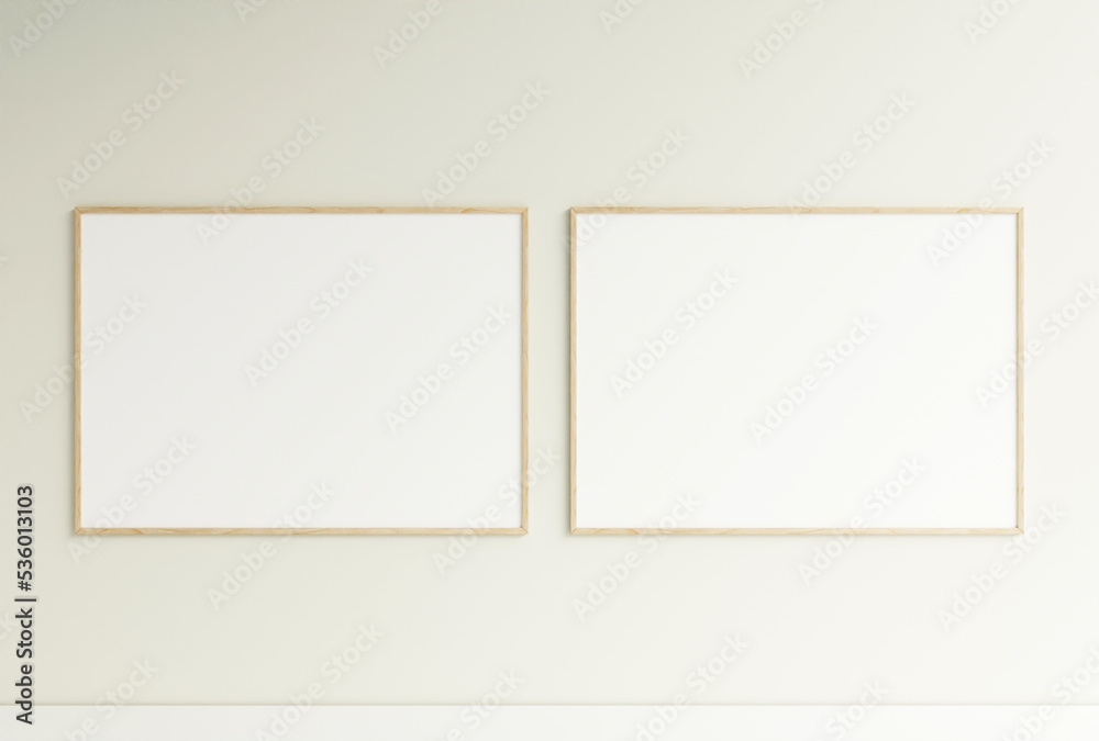 Clean and minimalist front view horizontal wooden photo or poster frame mockup hanging on the wall. 3d rendering. Clean and minimalist front view horizontal wooden photo or poster frame mockup hanging on the wall. 3d rendering.