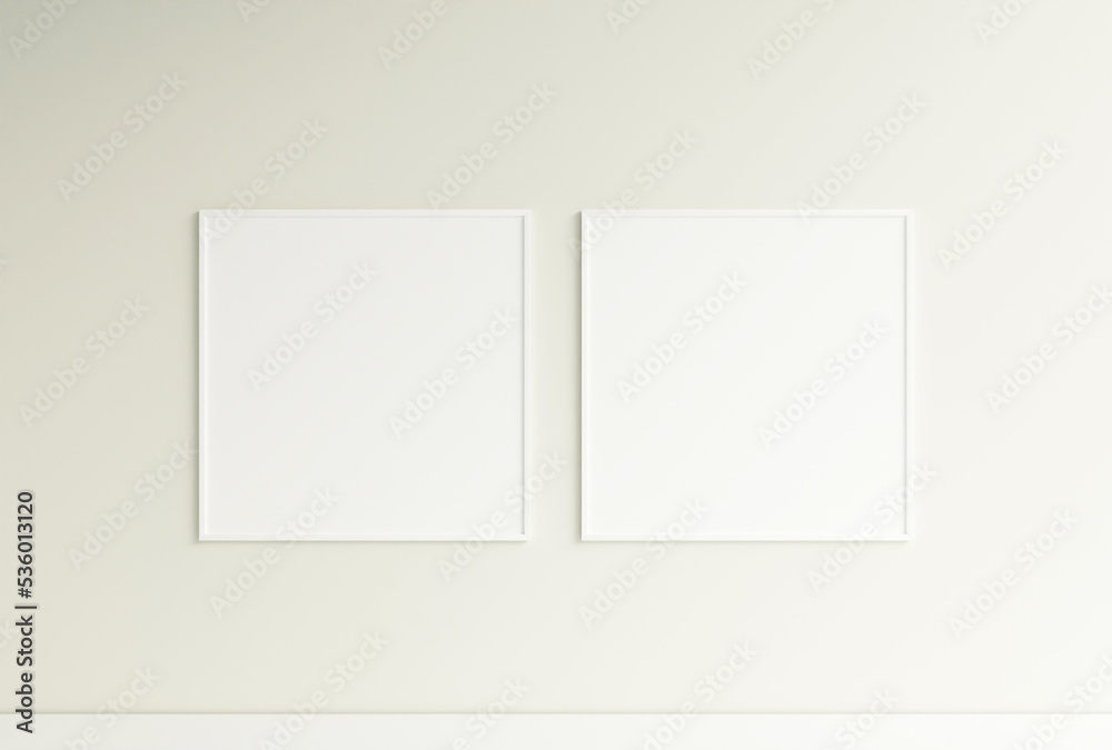 Clean and minimalist front view square white photo or poster frame mockup hanging on the wall. 3d rendering. Clean and minimalist front view square white photo or poster frame mockup hanging on the wall. 3d rendering.