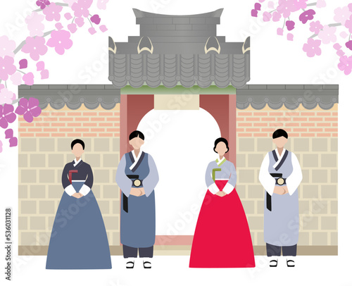 Korean hanbok family. Korean couple wearing traditional costumes. Korea gate in flat. Traditional Korean architecture.