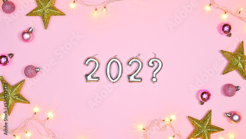 Creative Chrsitmas and new year background with 202? numbers and shiny ornamnets. Flat lay
