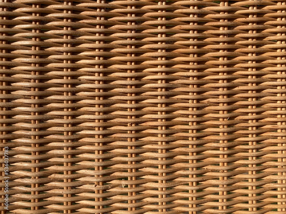 a beige braided rattan pattern a beige braided rattan pattern