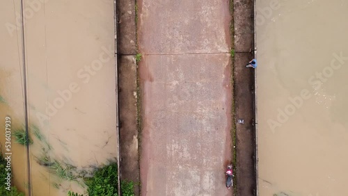 Top view Aerial photo from flying drone.Flooded rice paddies.Flooding the fields with water in which rice sown. View from above.