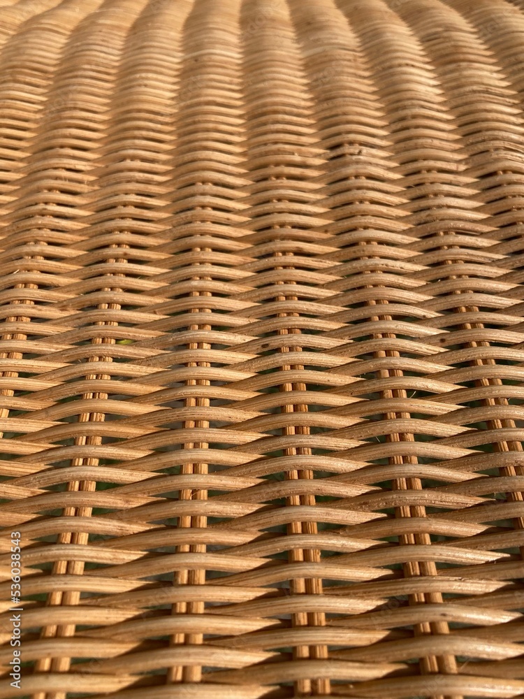 a beige braided rattan pattern a beige braided rattan pattern