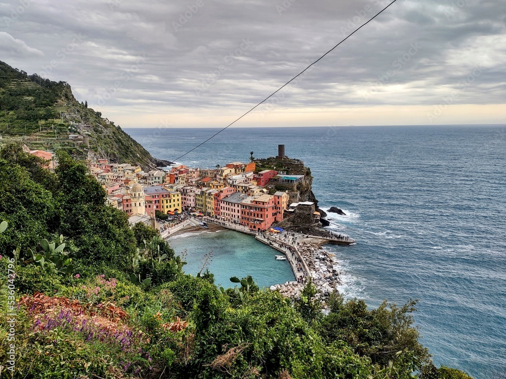 Seacoast of Cinque Terre with its villages and nature in Italy during a gloomy day of spring