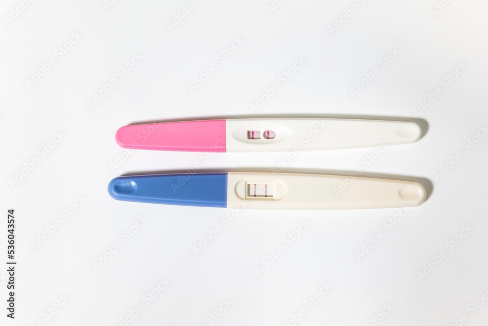 two positive pregnancy tests on a white background two positive pregnancy tests on a white background