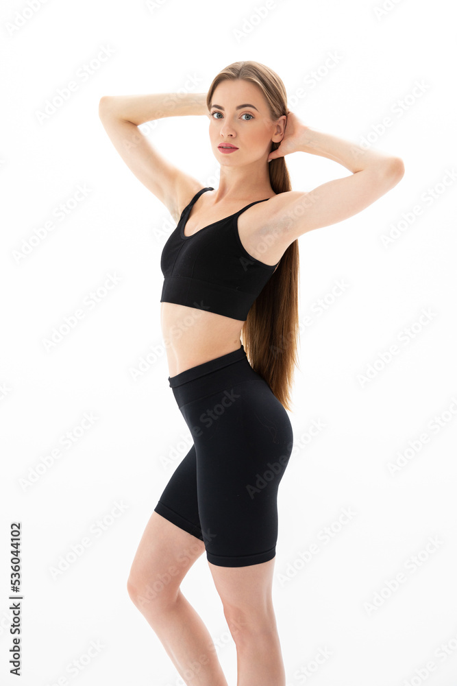 Beautiful sporty woman on white background Beautiful sporty woman on white background