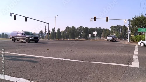 NO POWER ON TRAFFIC LIGHTS AT INTERSECTION DURING DAY photo