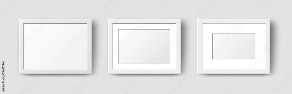 Realistic Horizontal Rectangle Empty Wall Photo Frames set. Vector white picture frame mockup template with shadow on grey background. Mockup for poster, banner, photo gallery, painting, presentation. Realistic Horizontal Rectangle Empty Wall Photo Frames set. Vector white picture frame mockup template with shadow on grey background. Mockup for poster, banner, photo gallery, painting, presentation.