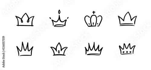 Doodle crown hand drawn set. Doodle princess crown, queen tiara. Line sketch royal element. Queen, king hand drawn simple design element. Isolated vector illustration.