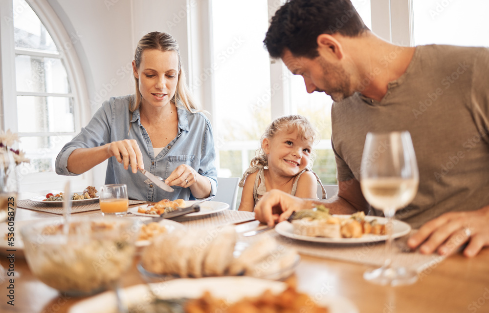 Dining table, family and child bonding with dad while enjoying food together in Canada home. Cute, happy and adorable daughter with smile looking at her father with love and appreciation. Dining table, family and child bonding with dad while enjoying food together in Canada home. Cute, happy and adorable daughter with smile looking at her father with love and appreciation.