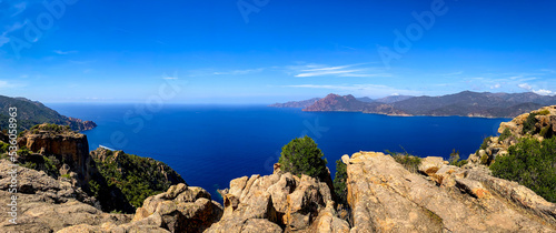 Fotografie View of sea, trees and mountains from the rocks in Piana, Calanques de Piana, Corsica island