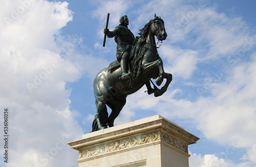 The Monument and fountain to Philip IV in the old town of Madrid, Spain, Europe. Historical bronze equestrian statue in Plaza de Oriente in the Austrias neighborhood of the Spanish capital.