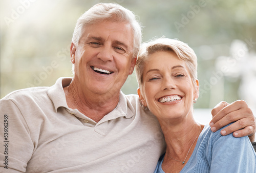 Portrait, peace and relax for senior couple with smile in retirement, freedom and marriage together in their house. Face of happy elderly man and woman with love and care in a room in their home