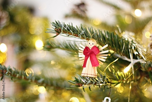 Straw angel on christmas tree
