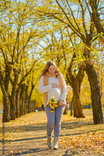 Beautiful future mother having great time outside © Inna Vlasova