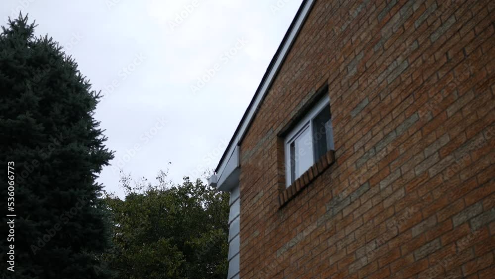 An establishing shot of a window of a 1950's American ranch home - Rear Facing An establishing shot of a window of a 1950's American ranch home - Rear Facing