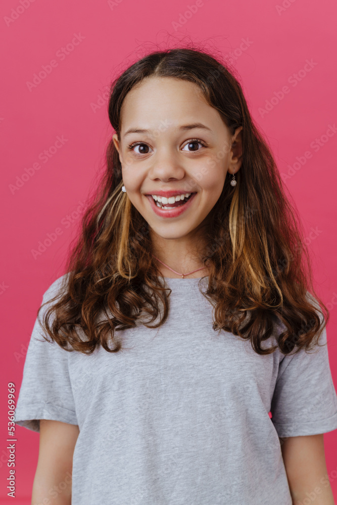 Young beautiful long-haired smiling happy girl with opened mouth Young beautiful long-haired smiling happy girl with opened mouth