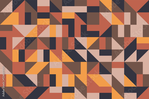 Abstract geometric mosaic seamless pattern with triangle shapes. Black, brown, orange and yellow tracery tileable background design photo