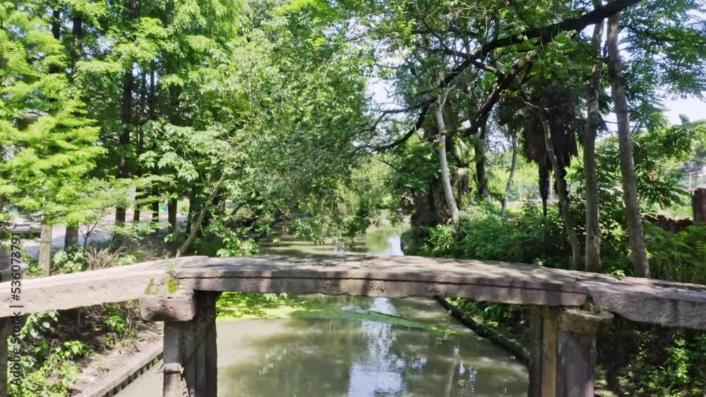 stone,pedestrian bridge over river in countryside stone,pedestrian bridge over river in countryside