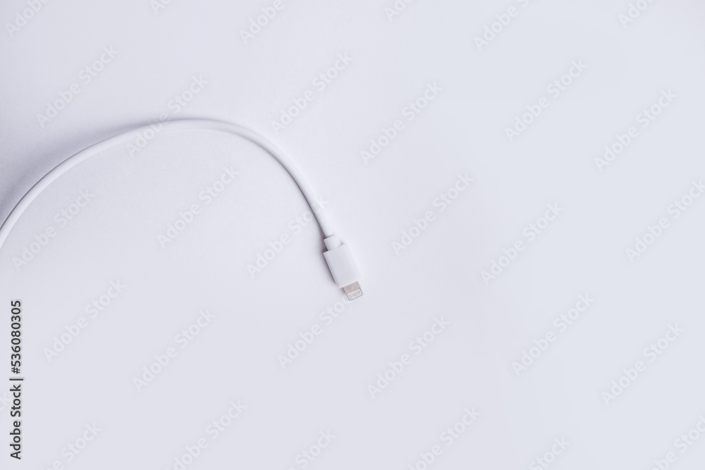 Close up white USB and micro USB cable plug isolated on white background Close up white USB and micro USB cable plug isolated on white background