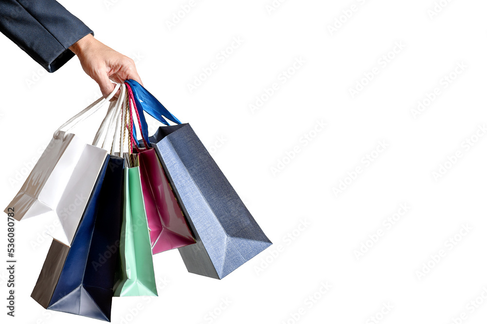 Hand with bags on a white background. Shopping concept