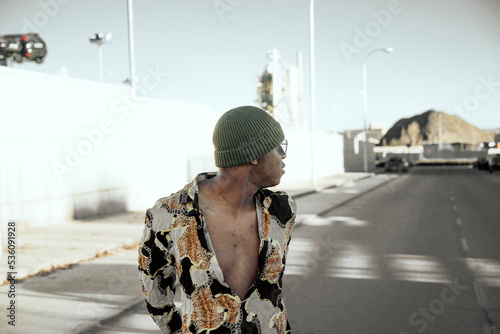 Young black man on city street photo