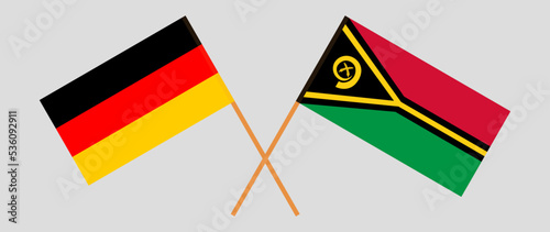 Crossed flags of Germany and Vanuatu. Official colors. Correct proportion