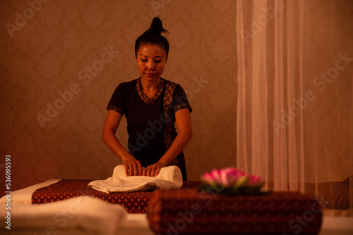 Thai woman decorating massage salon photo