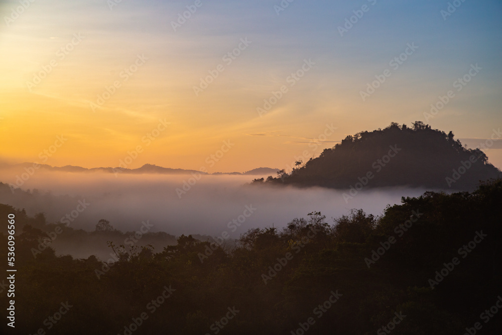 Sunrise sea of fog above Khao Sok national park, Surat Thani, Thailand Sunrise sea of fog above Khao Sok national park, Surat Thani, Thailand