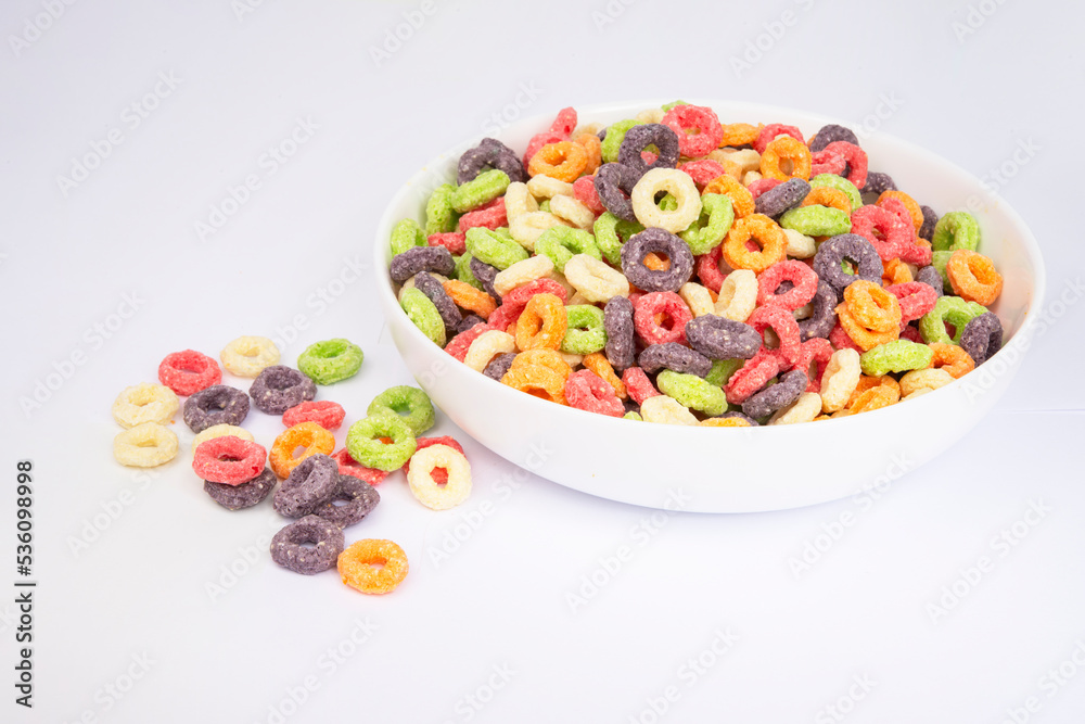 Multicolor loops breakfast cereal rings on the white background
