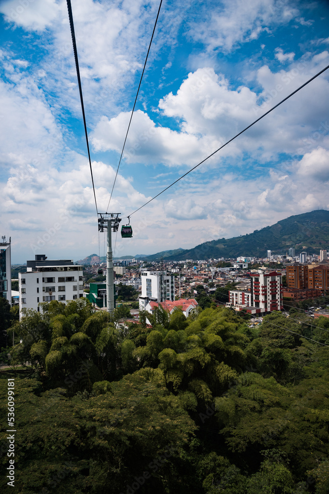 Pereira, Risaralda, Colombia. February 3, 2022: Megacable cars and buildings in the city.
