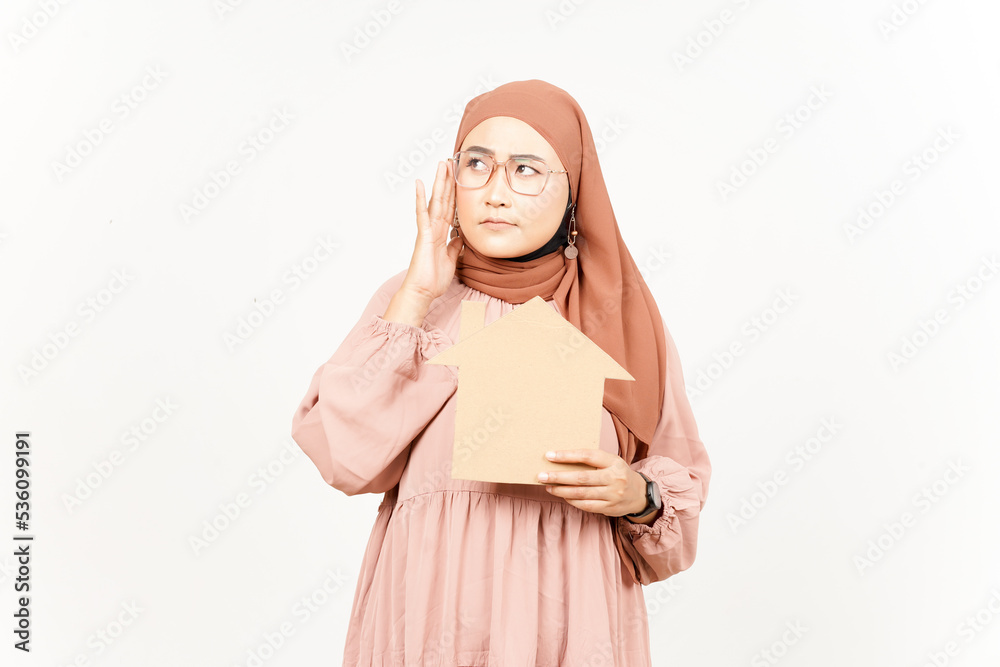 Thinking and Holding Cutout House of Beautiful Asian Woman Wearing Hijab Isolated On White Thinking and Holding Cutout House of Beautiful Asian Woman Wearing Hijab Isolated On White