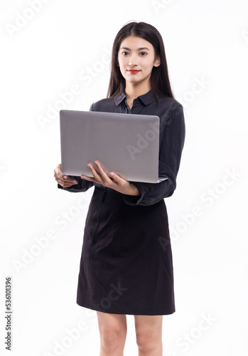 A business woman with a computer and a black skirt on a white background