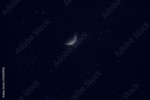 Fototapeta Naklejka Na Ścianę i Meble -  The sickle moon in the sky. Sky full of stars and moon. The crescent moon....