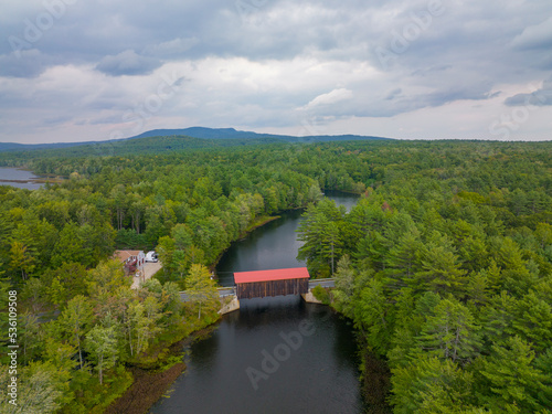 Hancock Greenfield Covered Bridge aerial view on Cantoocook River between town of Hancock and Greenfield in New Hampshire NH, USA.  photo